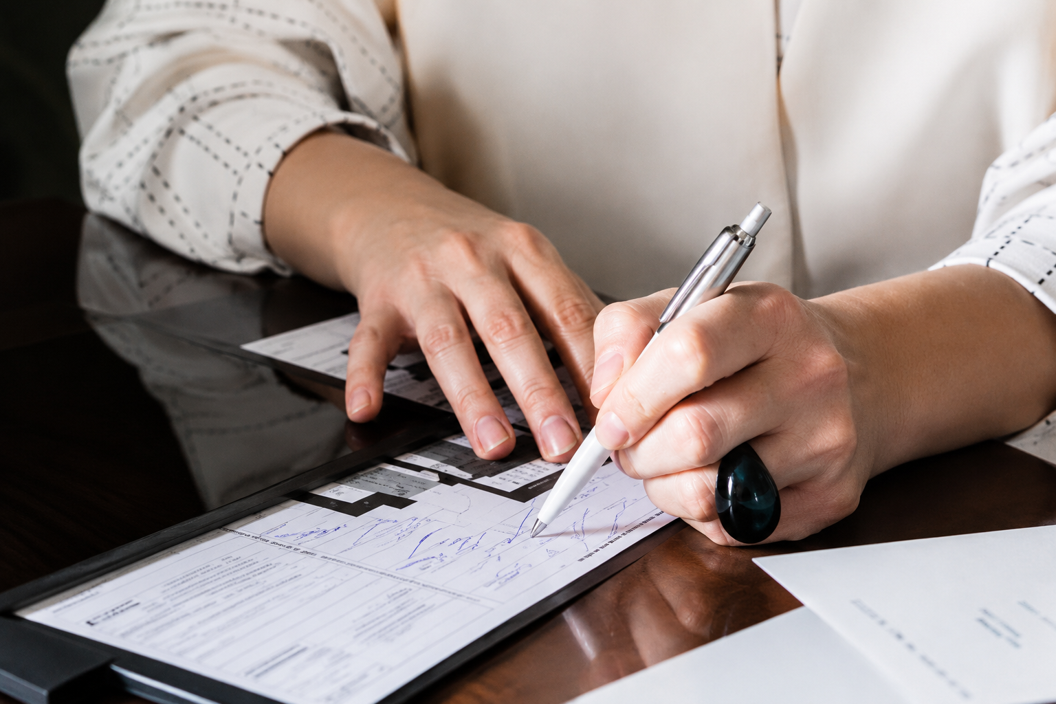Ace Mobile Notary and Courier team handling important documents